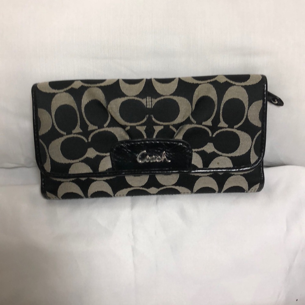 Black and gray C patterned Coach wallet